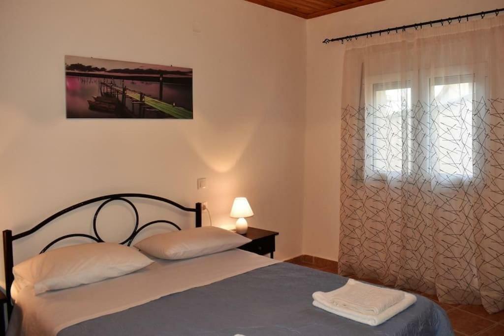 Giannoylas Hoyse{pigadi Agios Matthaios (Corfu)